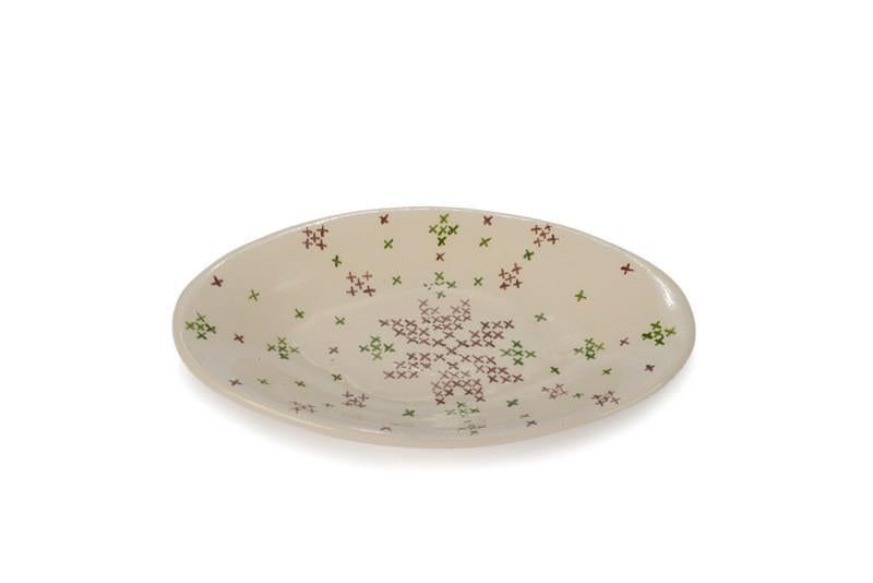 Serving plates decorated with handmade traditional embroidery